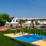 Área Juegos Columpios